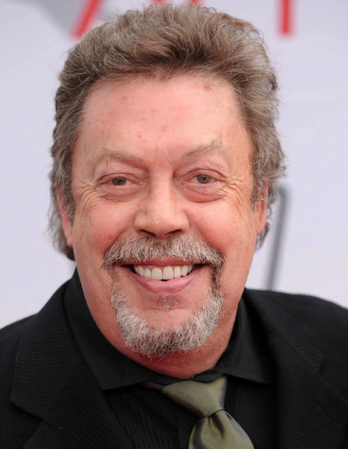 Igralec, Tim Curry,